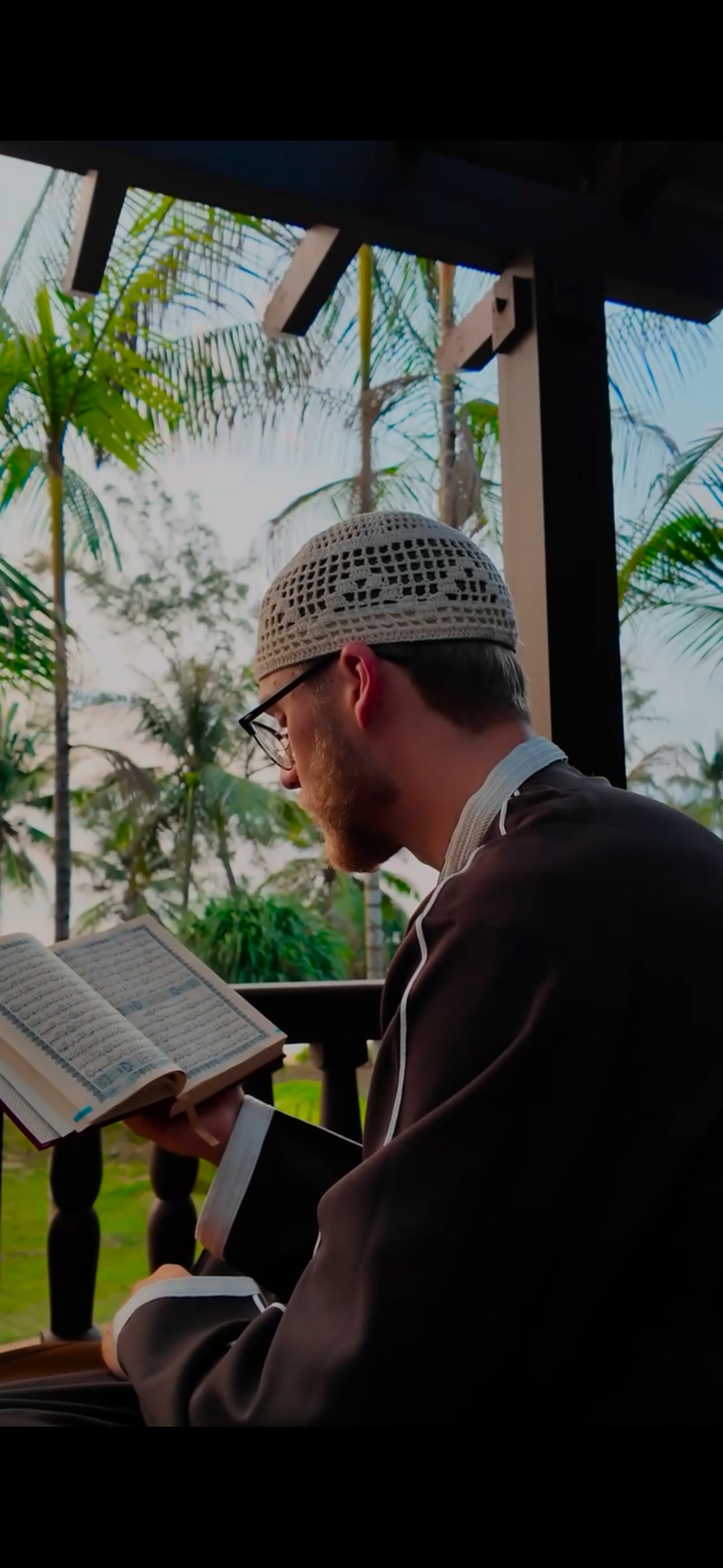 Justyn reading Qur'an